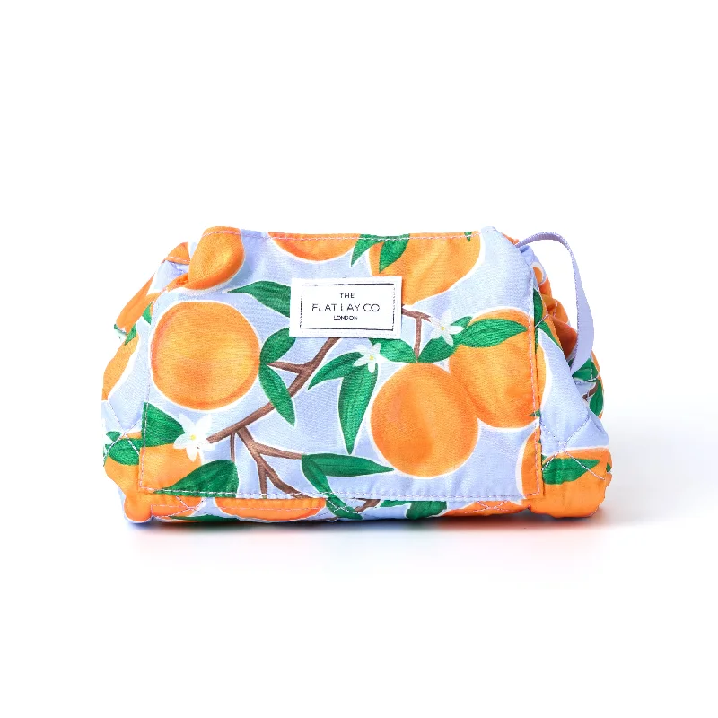 Waterproof Women's Makeup Bags in Pink for Beach Vacations and Poolside UseDrawstring Flat Lay Makeup Bag - Mediterranean Oranges