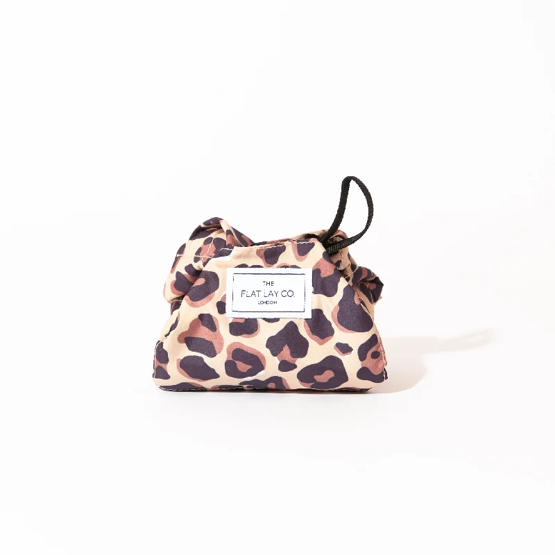 Vegan Leather Women's Makeup Bags in Black for a Cruelty - Free and Stylish OptionMini Drawstring Flat Lay Makeup Bag - Leopard Print