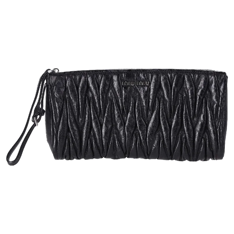 Snake - Skin Effect Clutch in Green for Exotic PartiesMiu Miu Matelasse Clutch Bag in Black Leather