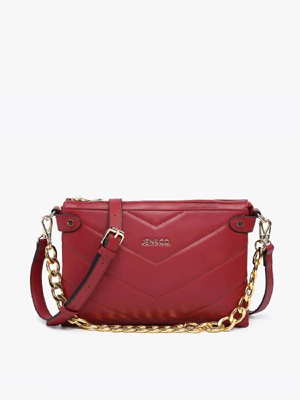 Women's Small Leather Crossbody Bag in Black with Gold Hardware for Evening PartiesWomen's Britt Puffer Crossbody W/ Snaps Bag In Red